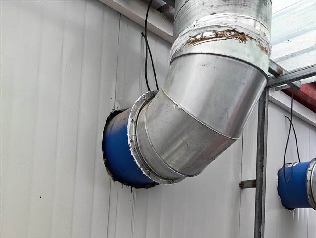 EG Series axial fan connected to ductwork for energy-saving industrial ventilation solutions