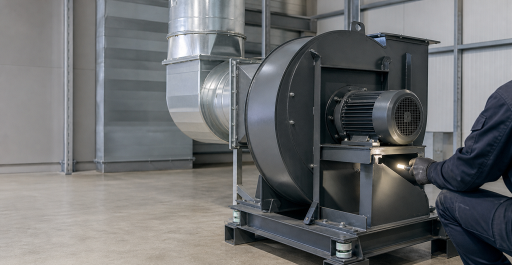 industrial ventilation fan maintenance inspection in factory mechanical room